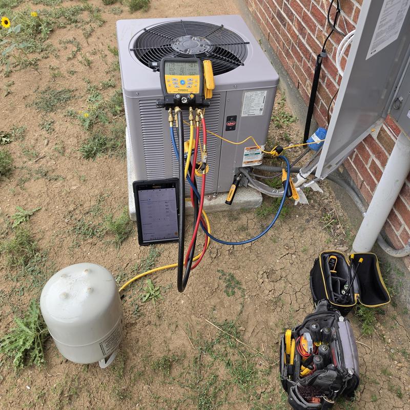 Weather King air conditioner with manifold gauge setup Weather King air conditioner with manifold gauge setup
