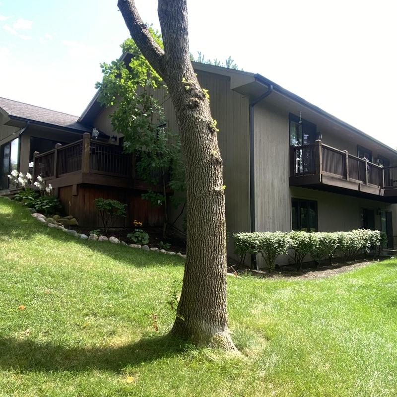 Gutters and gutter guards on residential home exterior