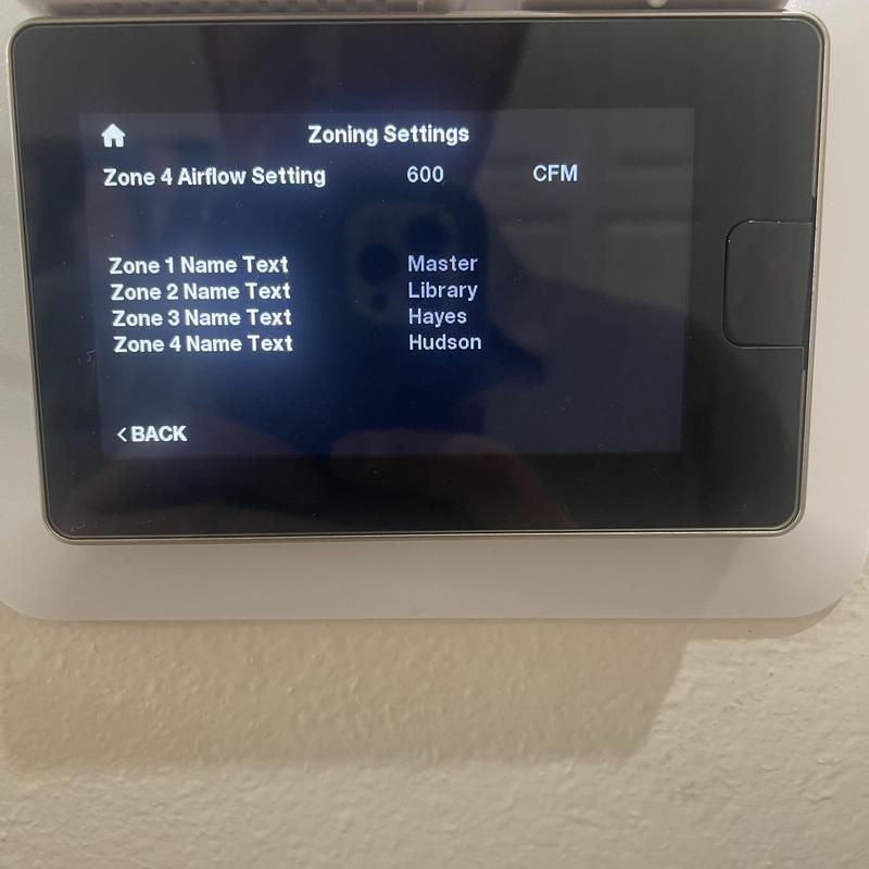 Air handler zoning control panel displaying airflow settings Air handler zoning control panel displaying airflow settings