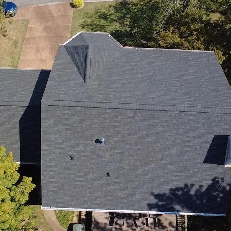 Asphalt shingle roof with hail damage inspection