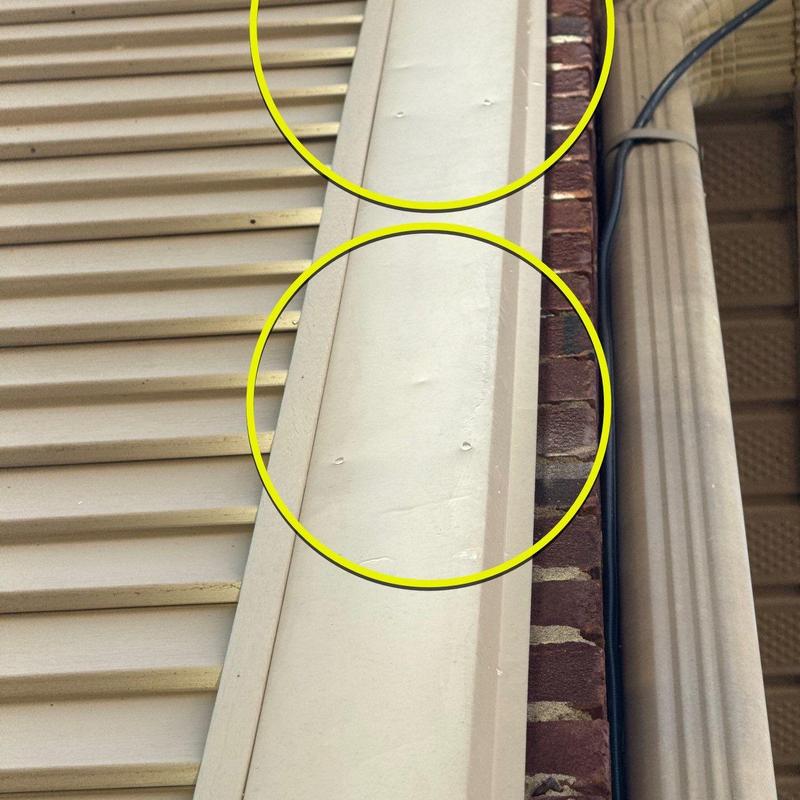 Metal roof fascia with hail damage dents