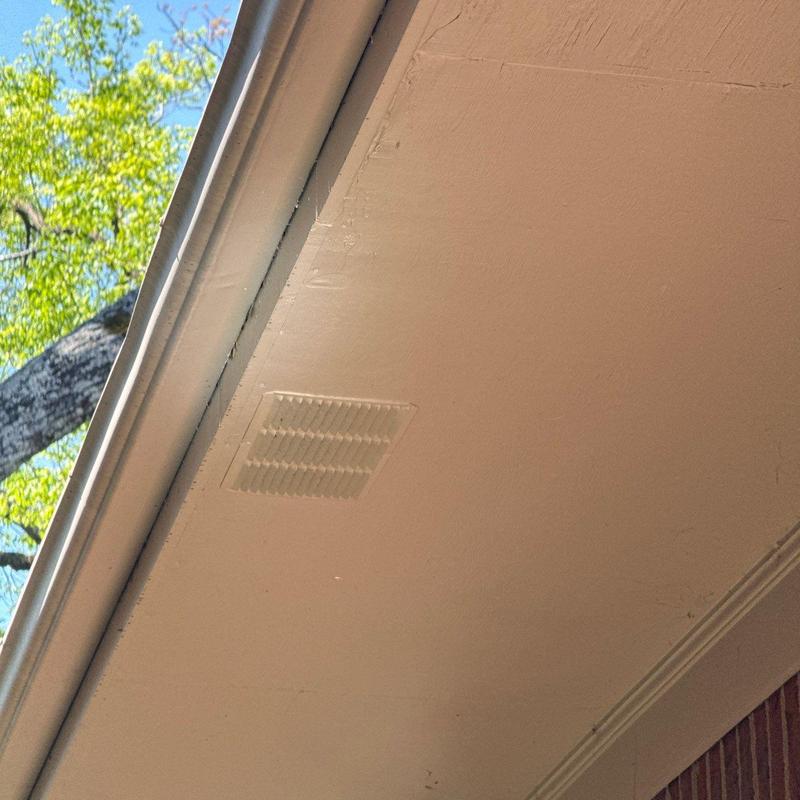 Soffit vent and roof edge inspection under eaves