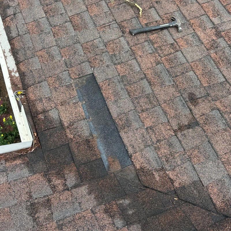 Asphalt shingles with damaged and missing sections