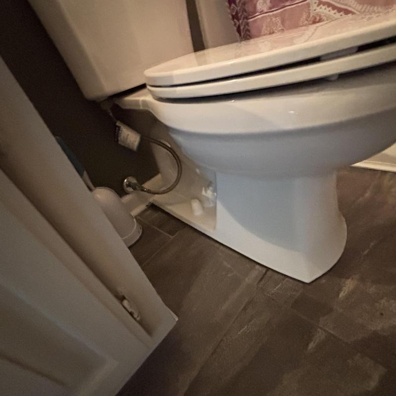 Toilet installation with hydraulic cement and caulking