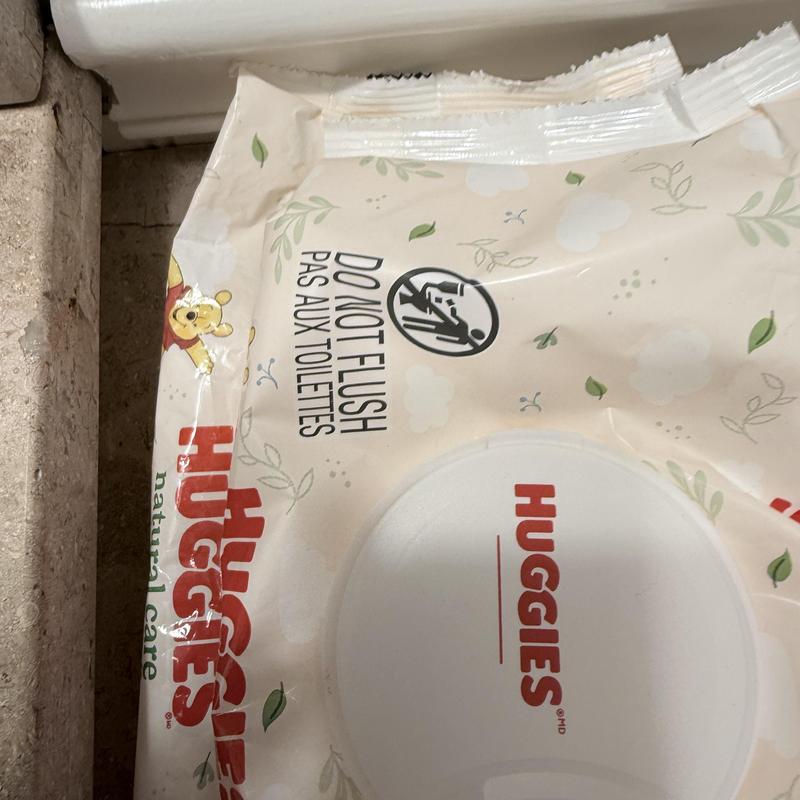 Baby wipes package near toilet warning label Baby wipes package near toilet warning label