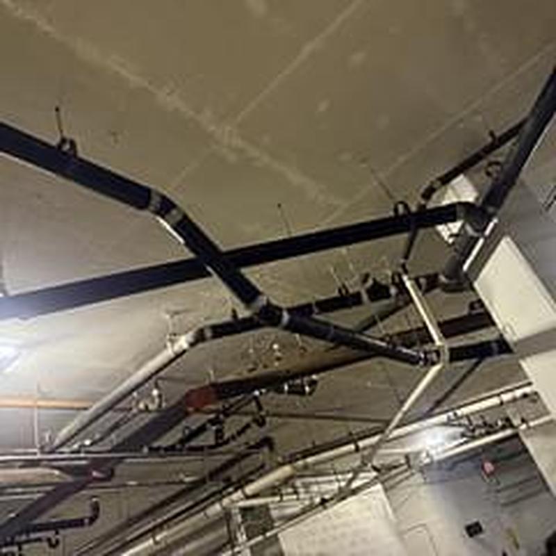 PVC repipe and cast iron pipe removal in garage ceiling