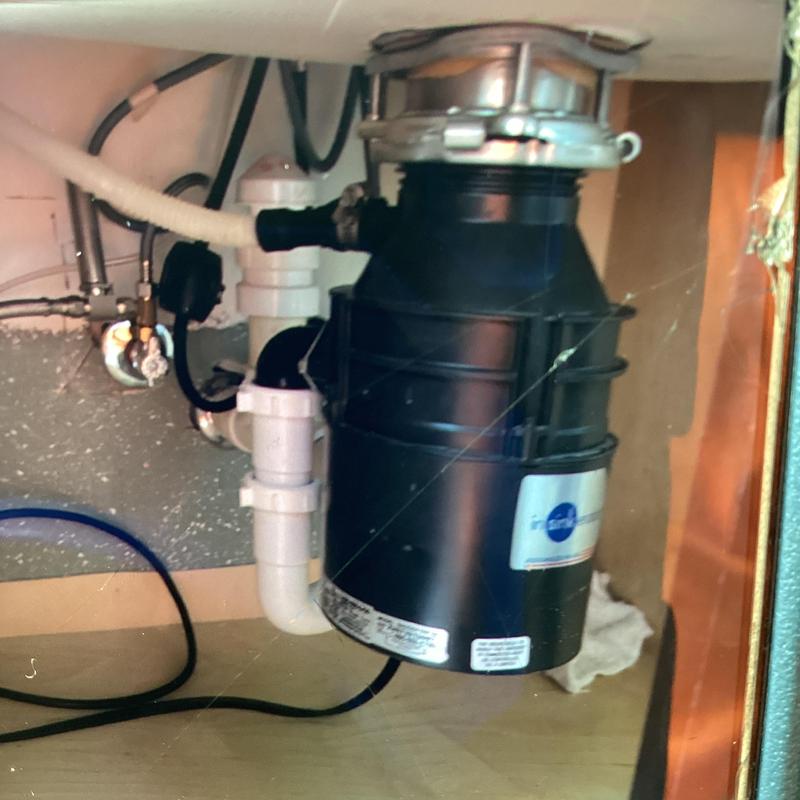 Garbage disposal and sink drain plumbing connections