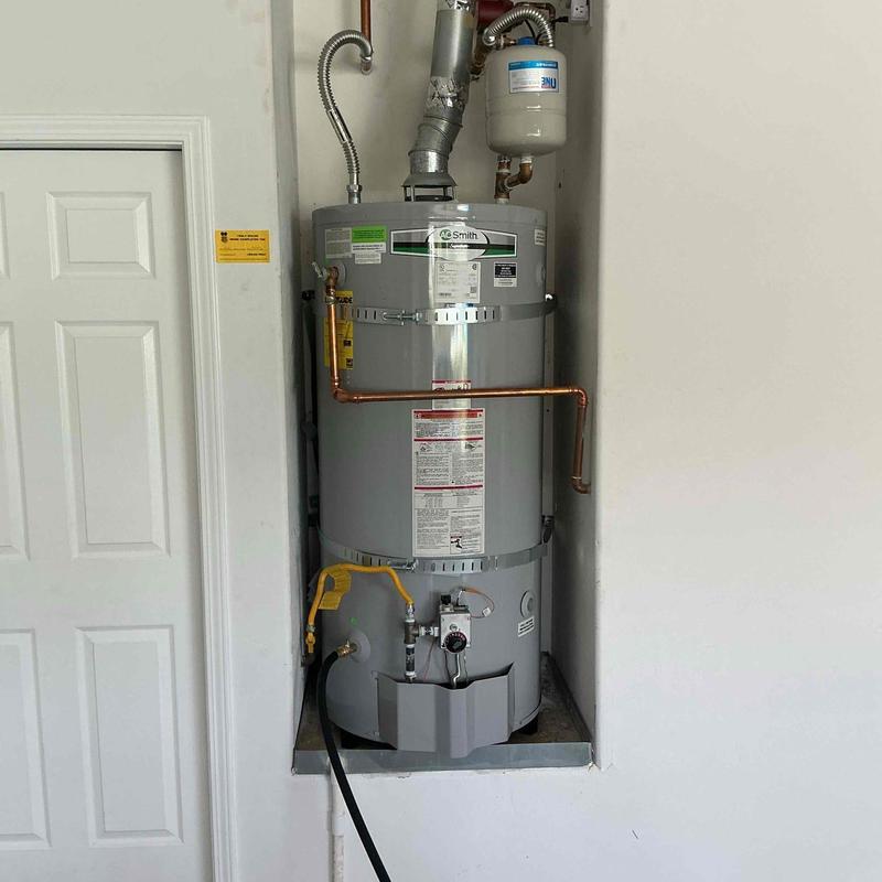 Water heater with piping and pressure tank installation Water heater with piping and pressure tank installation