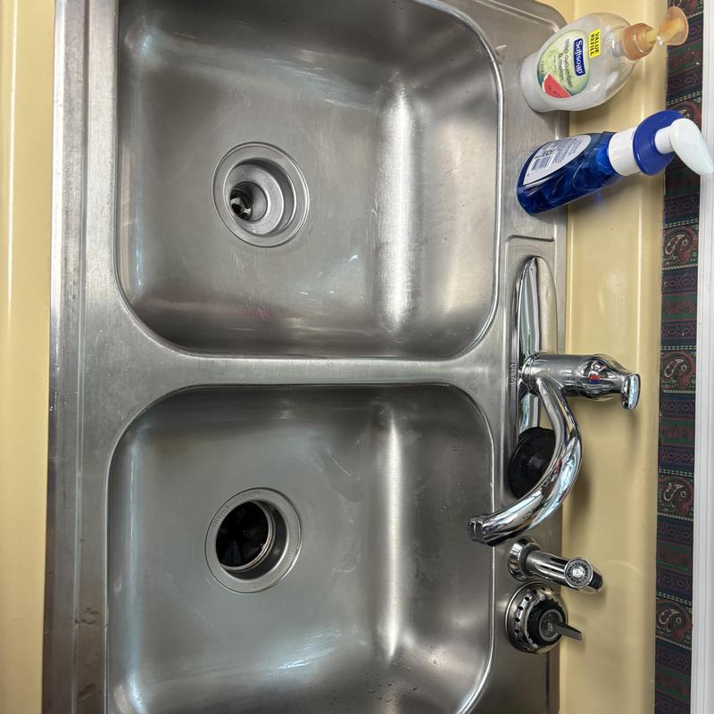 Kitchen sink drain and double basin plumbing system