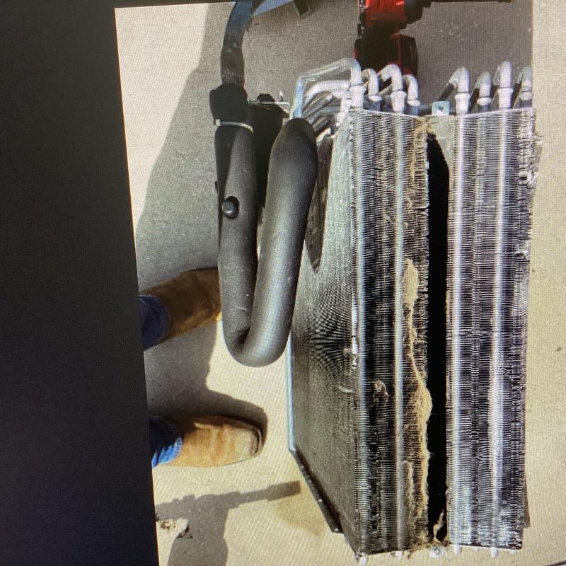 Evaporation coil with heavy dust buildup in HVAC unit Evaporation coil with heavy dust buildup in HVAC unit