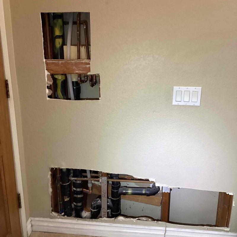 34-inch water line reroute behind drywall with pipes visible 34-inch water line reroute behind drywall with pipes visible