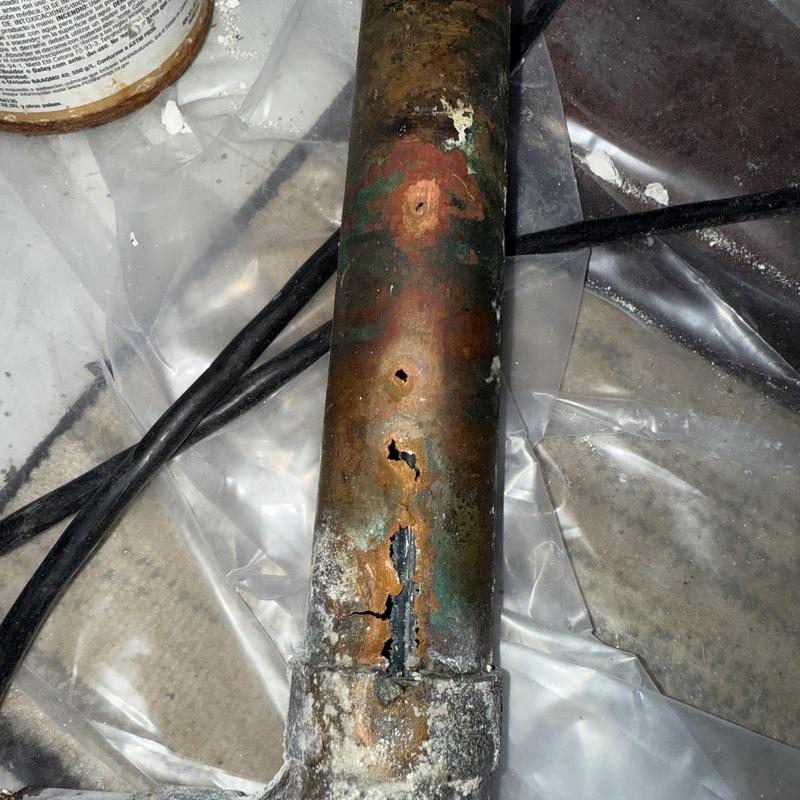 Copper water pipe with corrosion holes for leak repair
