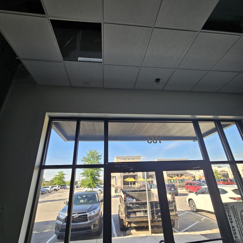Retail storefront glass doors and ceiling tile installation Retail storefront glass doors and ceiling tile installation
