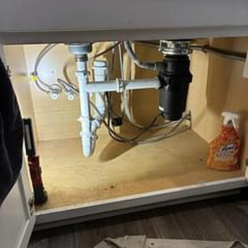 Kitchen sink drain pipes with new p-trap and tailpiece Kitchen sink drain pipes with new p-trap and tailpiece