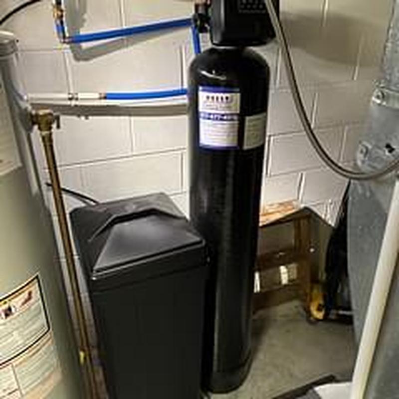 Water softener system with control valve installed Water softener system with control valve installed