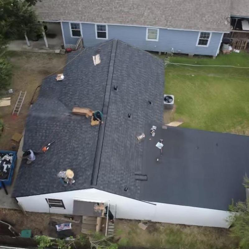 Architectural shingle roof installation on residential home