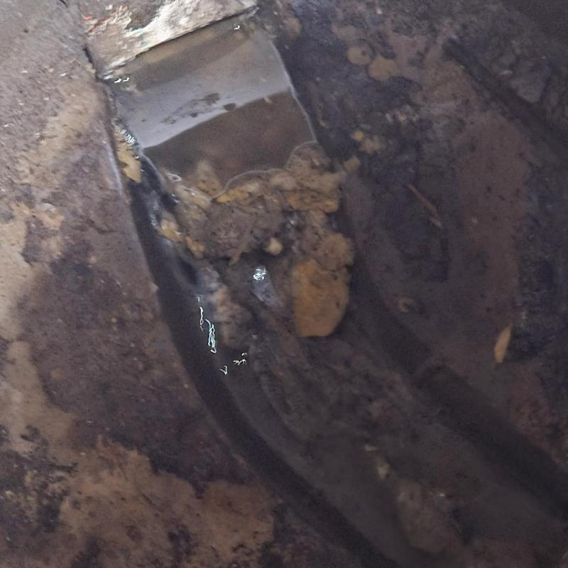 Manhole sewer jetting clearing blockage in Waterford apartment