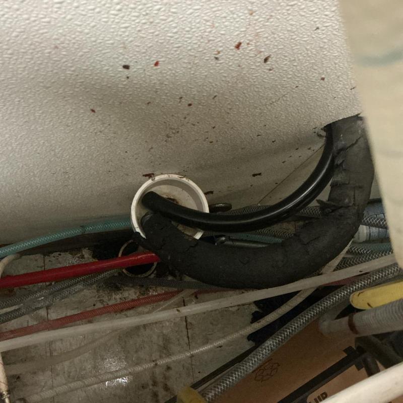 Drain pipe vacuum cleaning behind soda machine