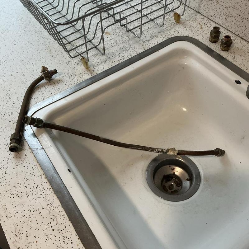 Compression shutoff valves removed from kitchen sink
