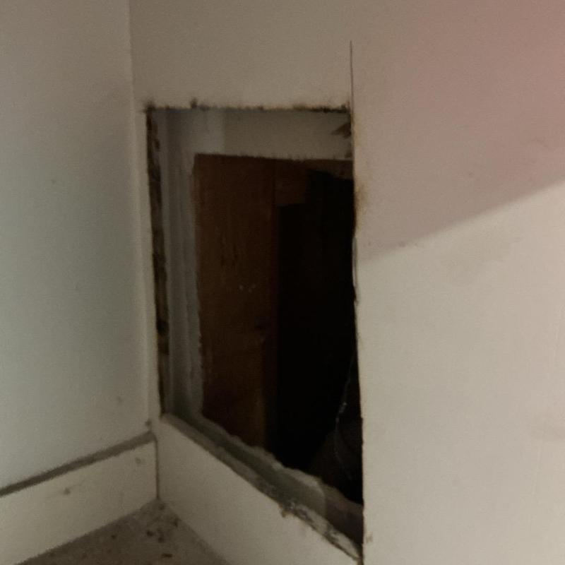 Wall access opening for plumbing valve installation