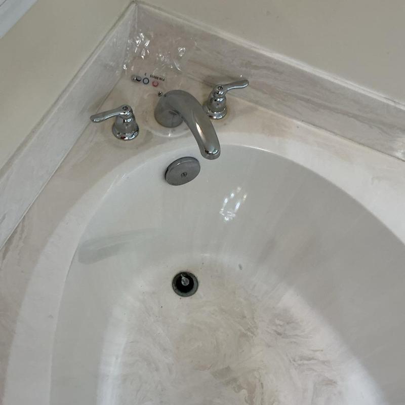 Delta Roman tub valve and trim installation in bathtub