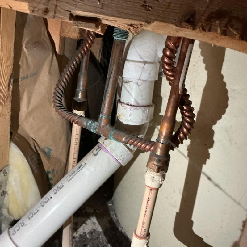 Copper tub rough-in valve with PVC drain pipes