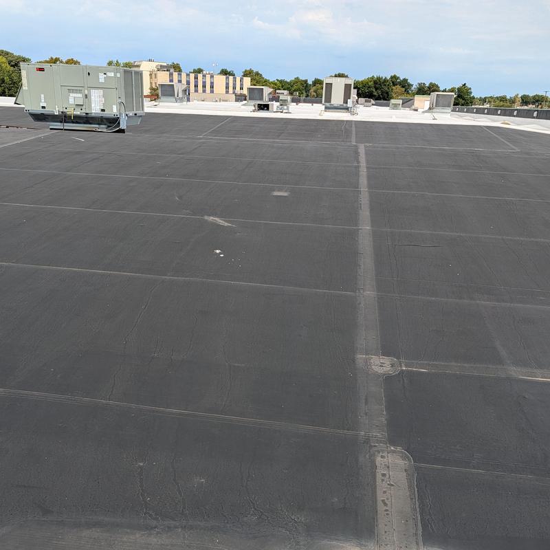 EPDM rubber roof restoration on commercial building