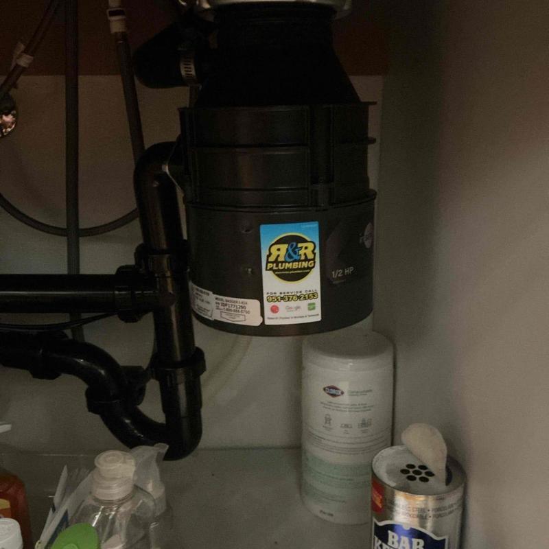 Garbage disposal unit under kitchen sink installation Garbage disposal unit under kitchen sink installation