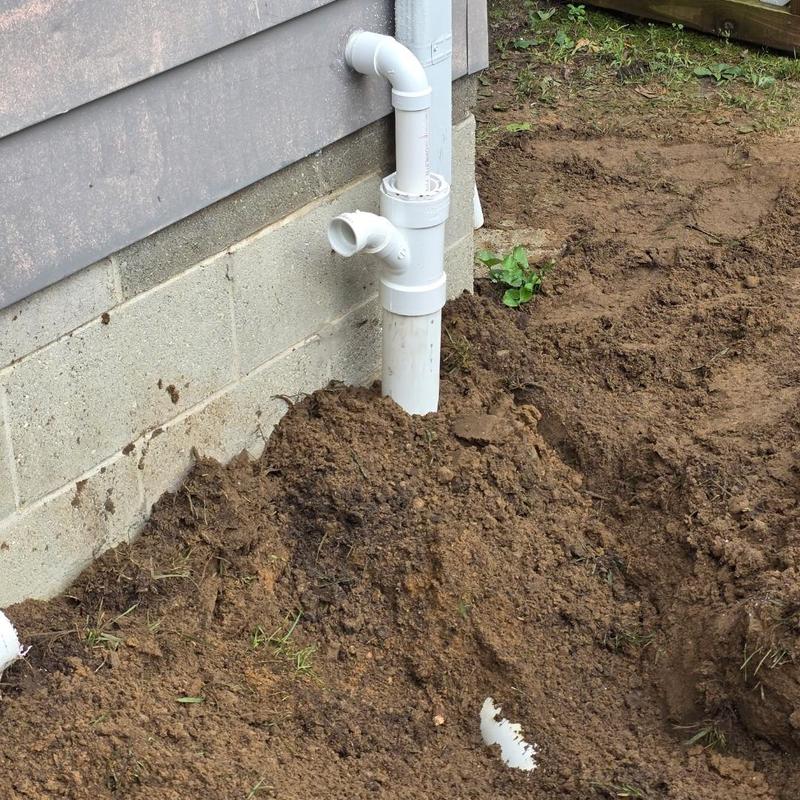 Septic bypass pipe and pop-up assembly installation outdoors