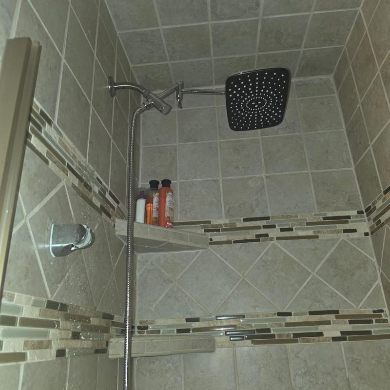 Shower head installation with tiled shower surround Shower head installation with tiled shower surround