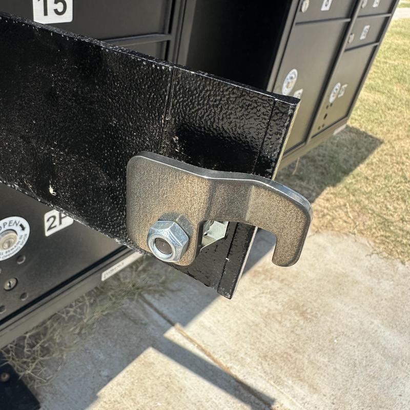Mailbox lock latch replacement on black mailbox unit Mailbox lock latch replacement on black mailbox unit