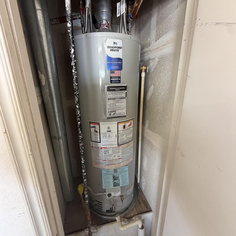 Natural gas water heater installation in utility closet Natural gas water heater installation in utility closet