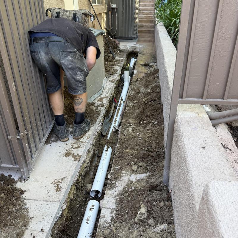 4-inch SDR drain piping installation in trench 4-inch SDR drain piping installation in trench