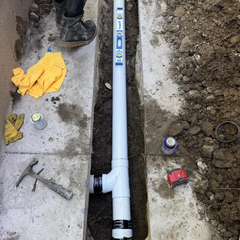 4-inch SDR drain piping in concrete trench installation 4-inch SDR drain piping in concrete trench installation