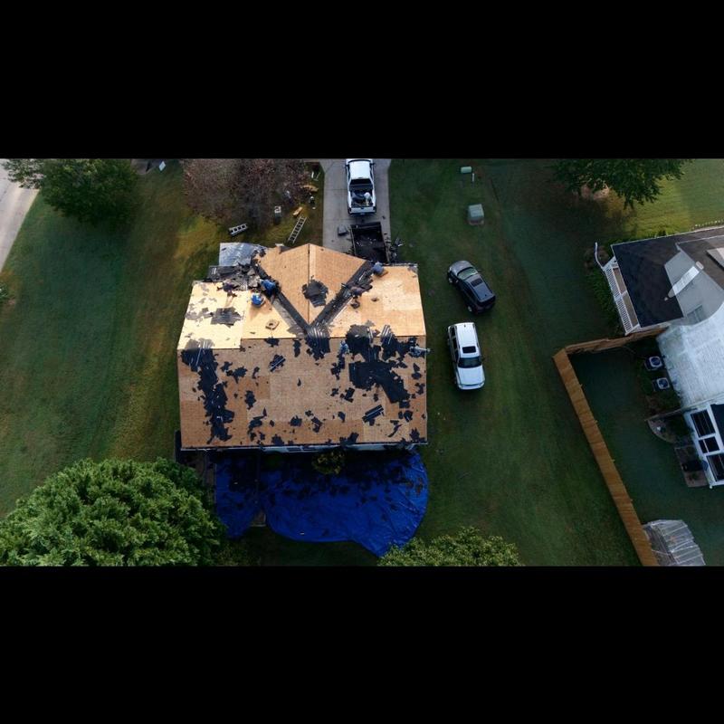 Roof decking removal and replacement with tarps Roof decking removal and replacement with tarps