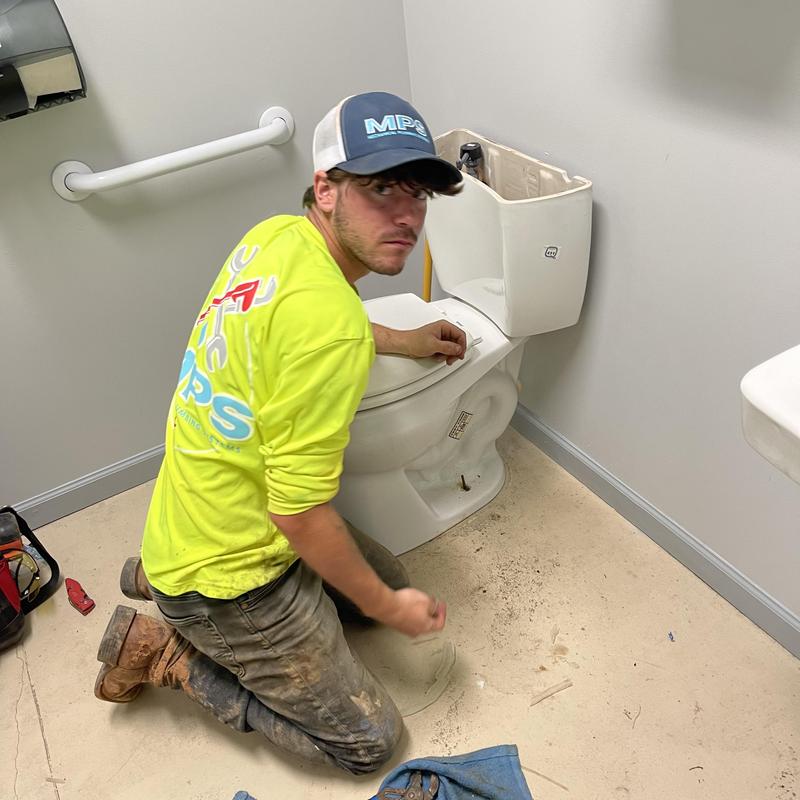 Toilet flange removal and drain snake cleaning in restroom Toilet flange removal and drain snake cleaning in restroom