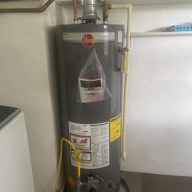 Rheem water heater with gas and plumbing connections Rheem water heater with gas and plumbing connections