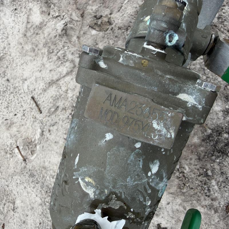 Backflow prevention valve with identification plate