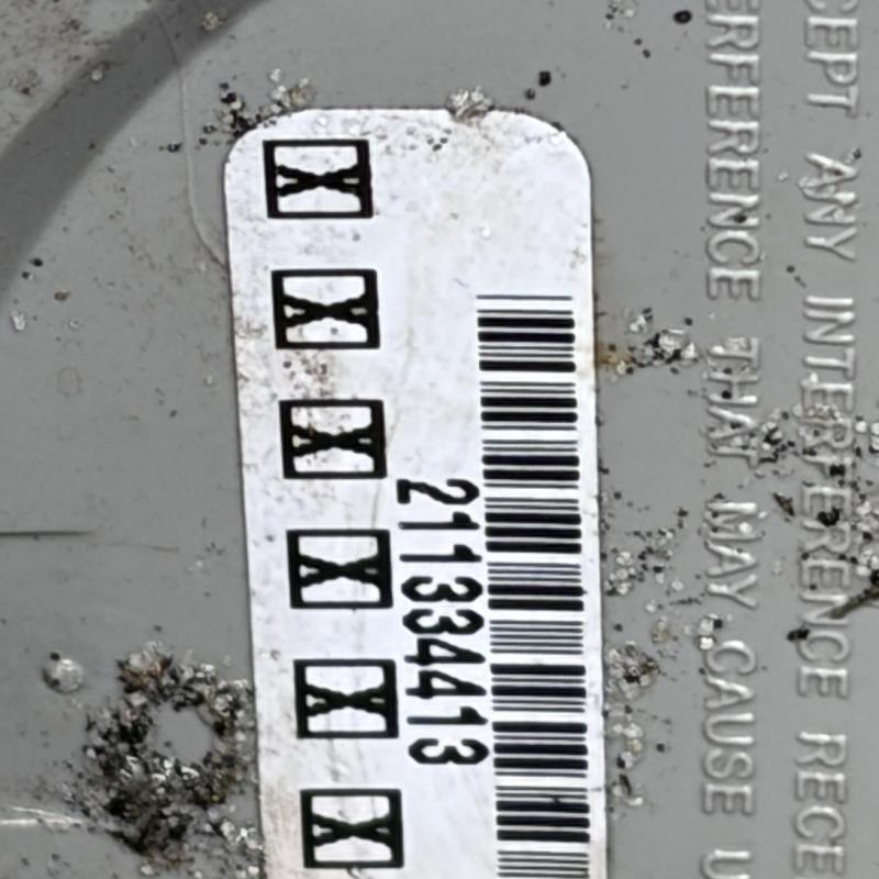 Backflow prevention device barcode label on valve housing