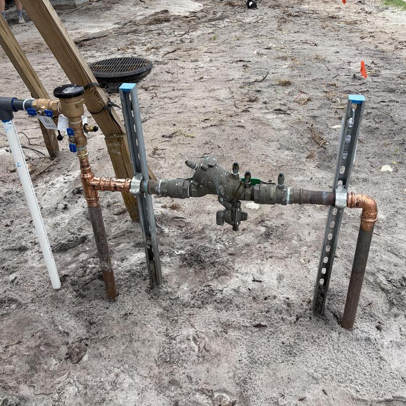 Backflow preventer assembly with pressure gauge and valves