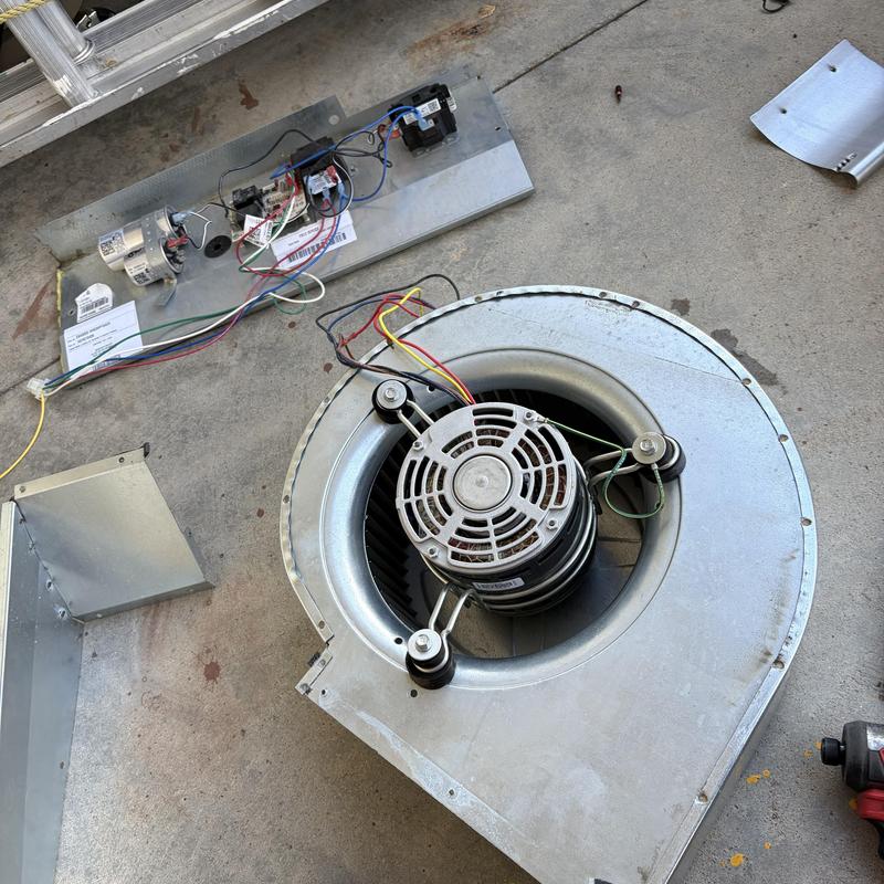 HVAC blower motor and control board on floor HVAC blower motor and control board on floor