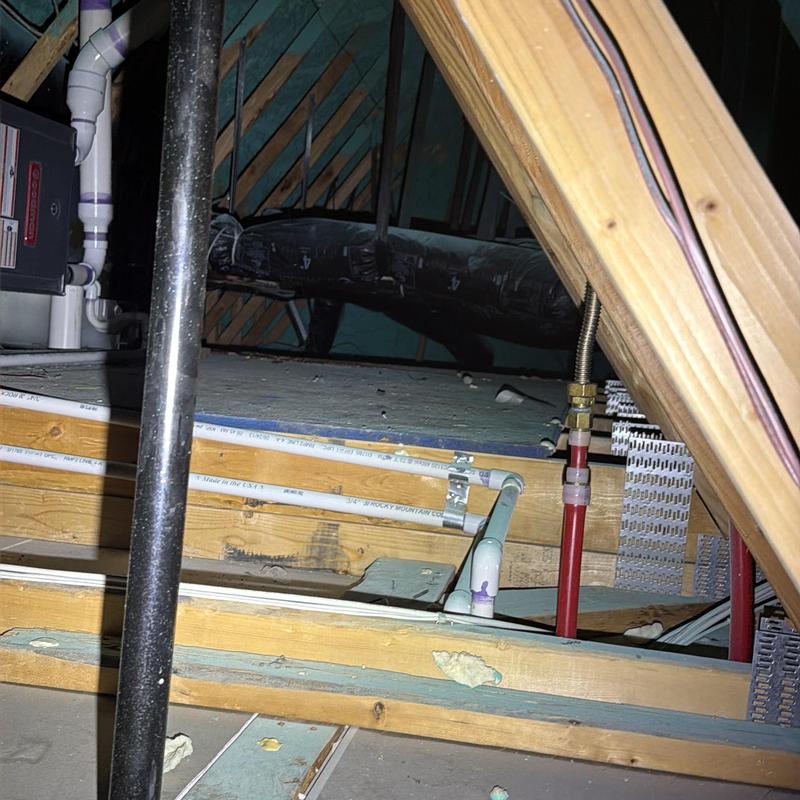 PVC water supply pipes in attic framing