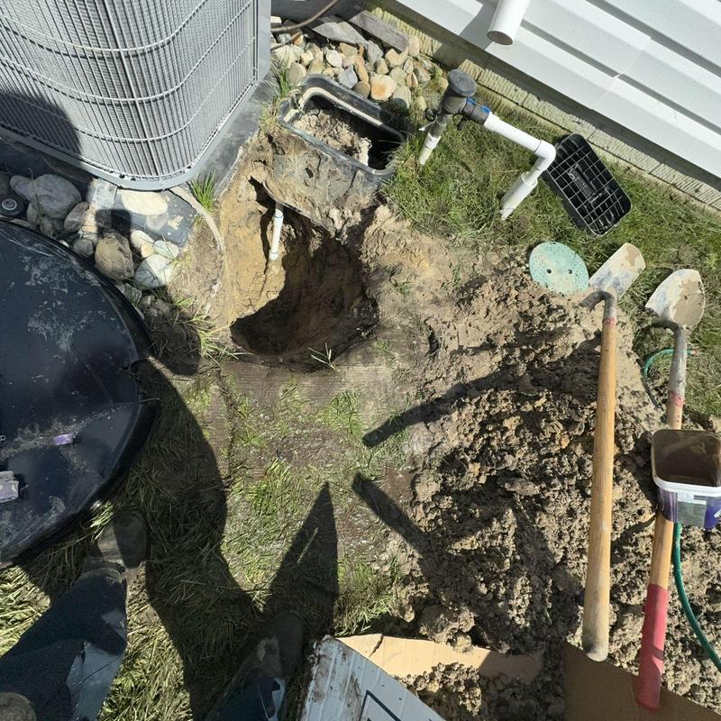 Broken water line near sprinkler backflow pit