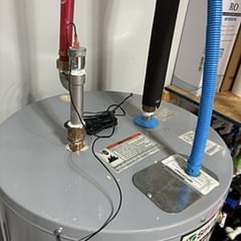 Water heater with new anode rod installed Water heater with new anode rod installed