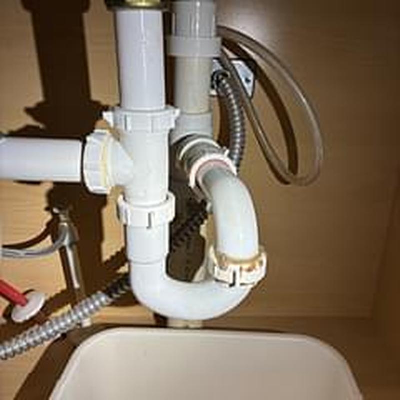 P trap plumbing with sprayer hose adjustment under sink P trap plumbing with sprayer hose adjustment under sink