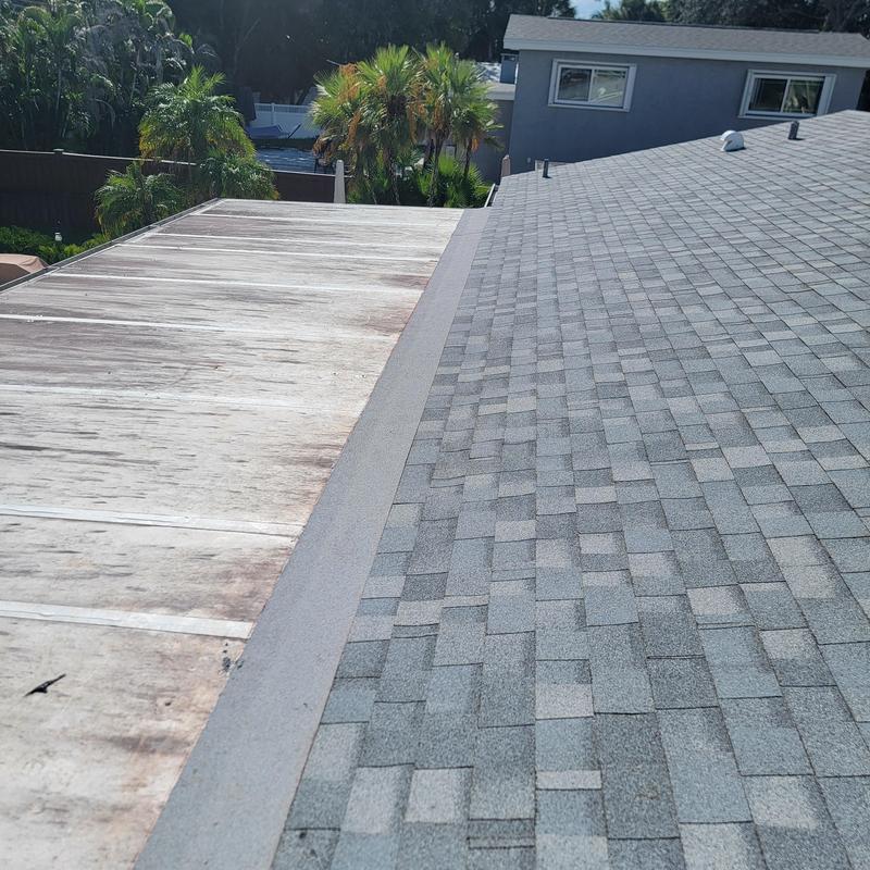 Shingle roof and sealing transition strip installation