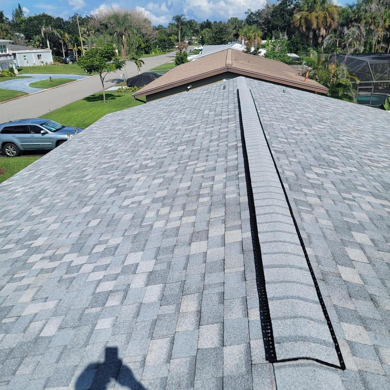 Shingle roof with new ridge vent installation in Melbourne FL