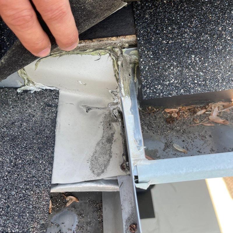 Roof flashing and shingle inspection for storm damage