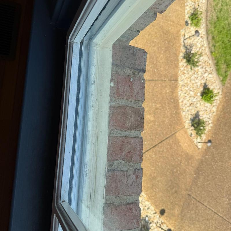 Window frame with weather seal inspection