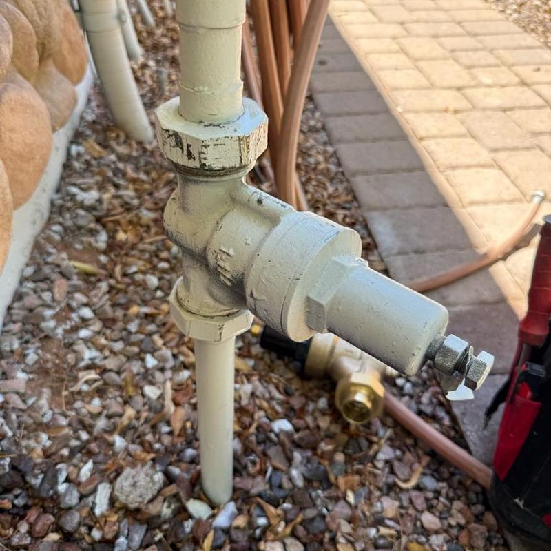 Pressure reducing valve installed on outdoor plumbing line